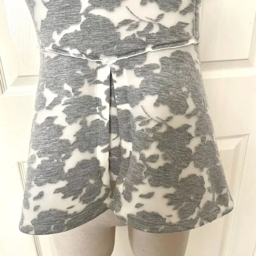 Akemi and Kin Grey floral peplum top